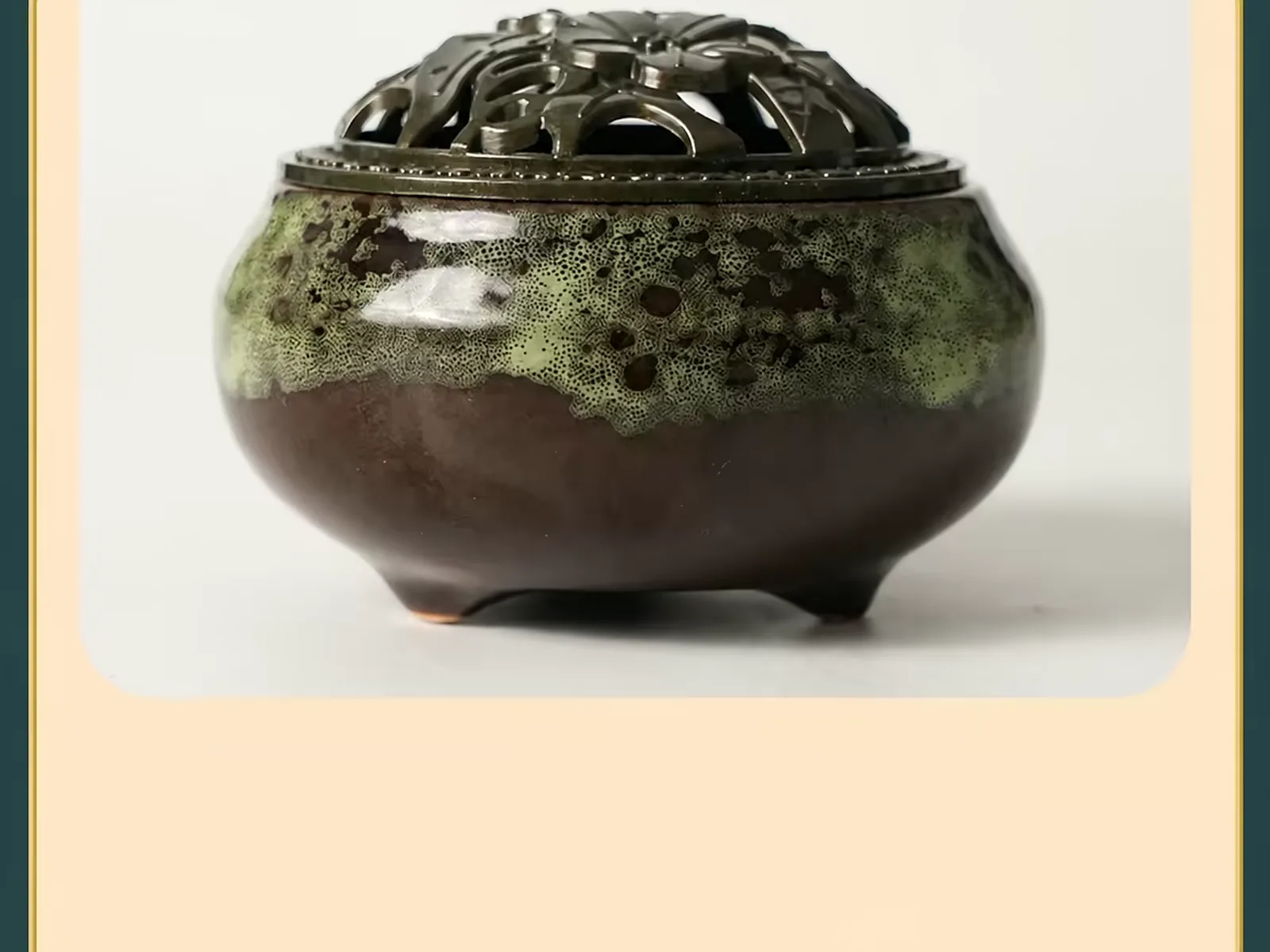 Green-glazed koro censer with an openwork metal lid seen from above