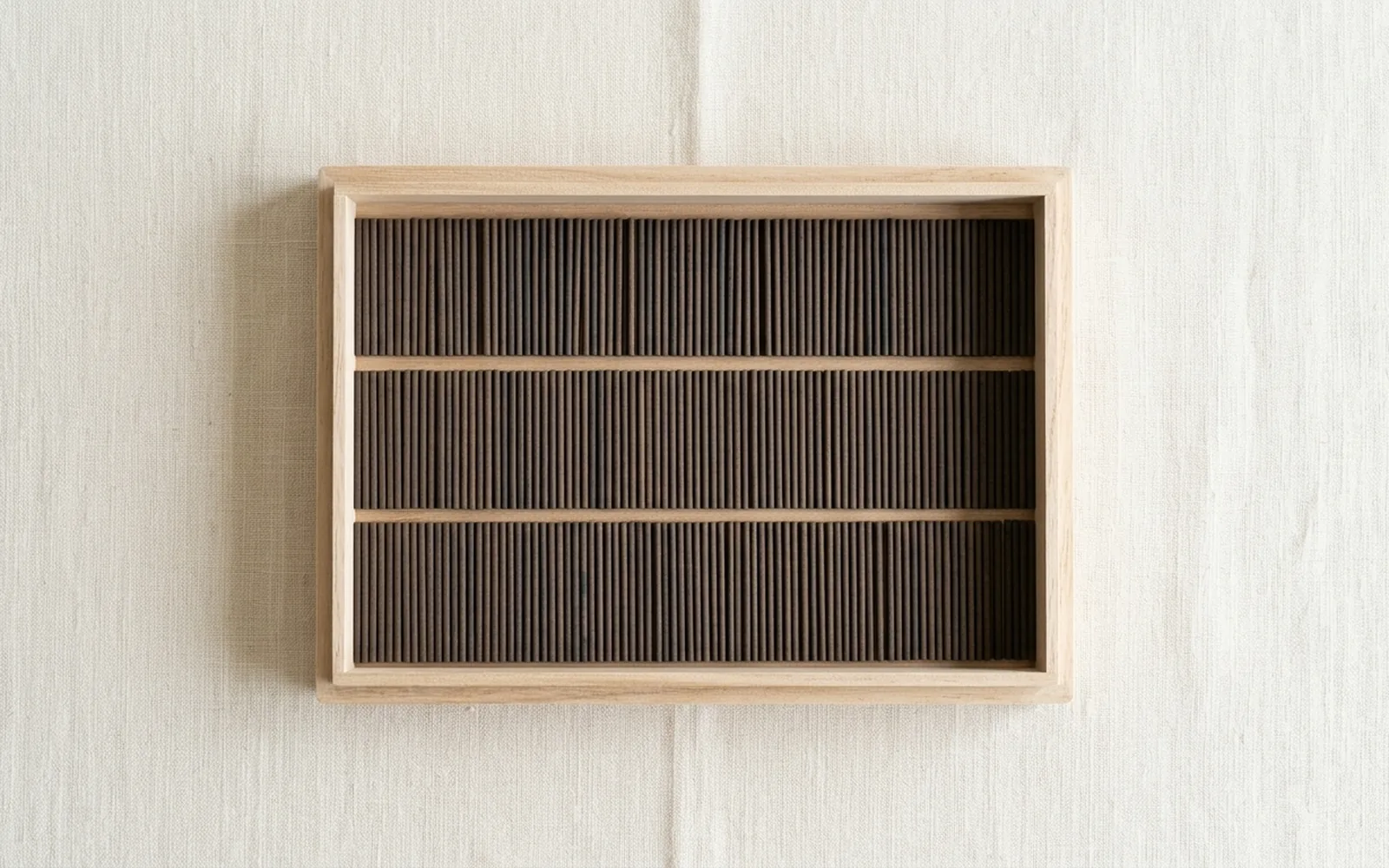 Short koh-grade agarwood incense sticks in a paulownia box for the Japanese retail market