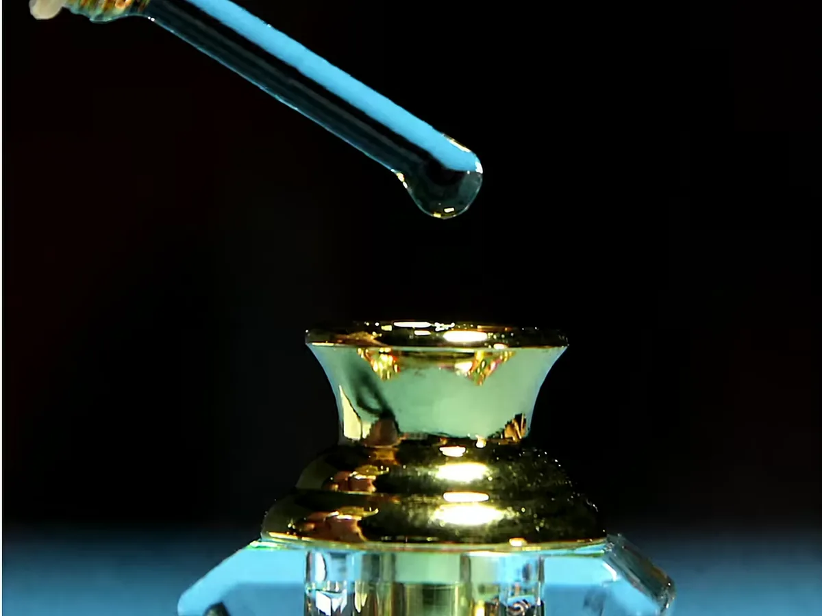 Oud oil bottles and packaging — close-up detail, oud oil bottle wholesale