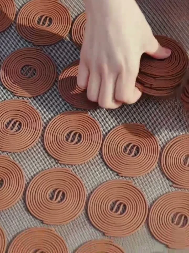 Incense coils sorted and stacked after forming, ready for packing