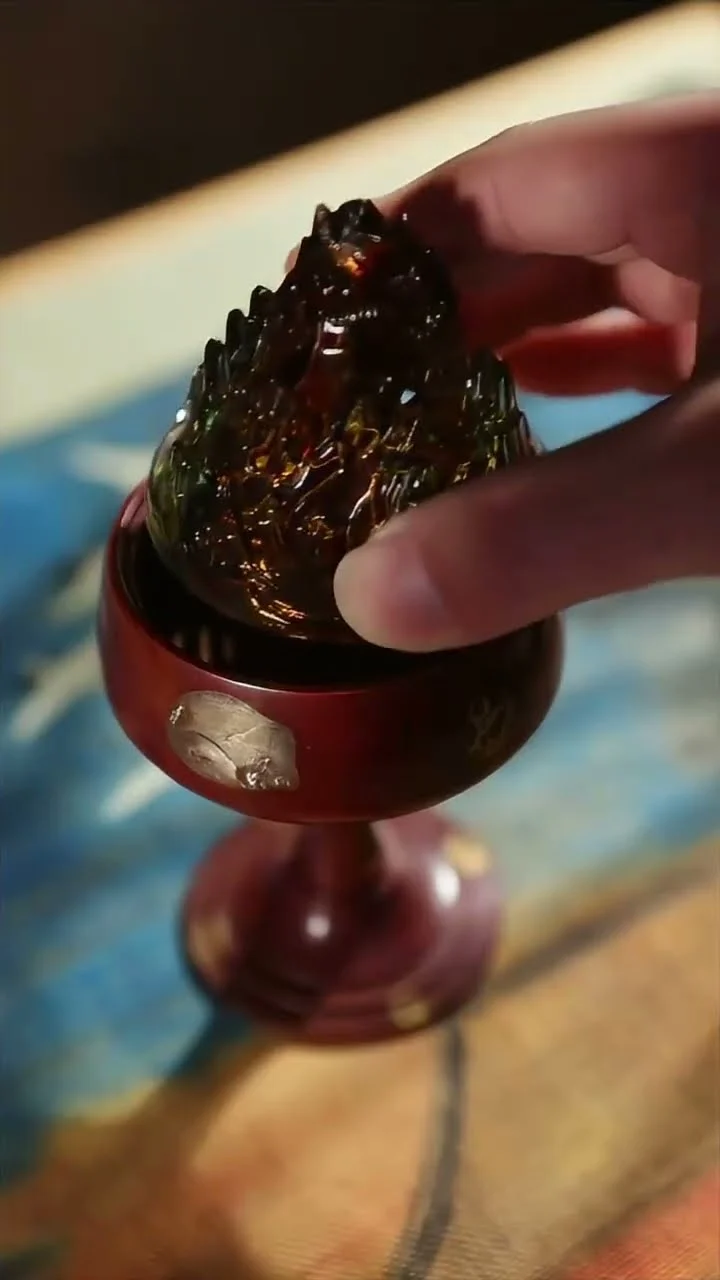 Incense set on an incense holder and lit at the tip